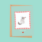 Racoon kisses birthday card with envelope